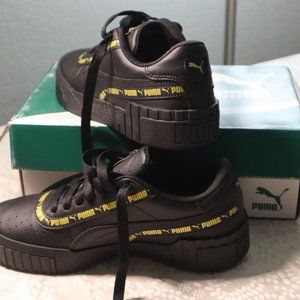 Solid Black Puma Sneakers
